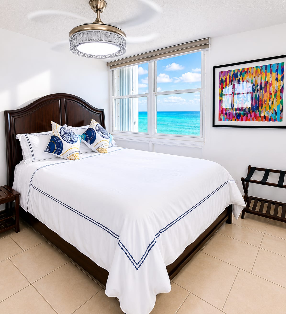Queen bedroom with ocean view through the window